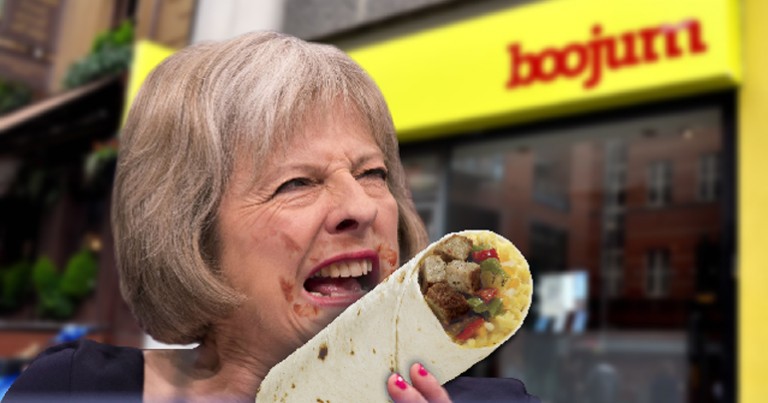 Theresa May destroys burrito on first official visit to NI