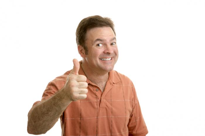 smiling man with thumbs up