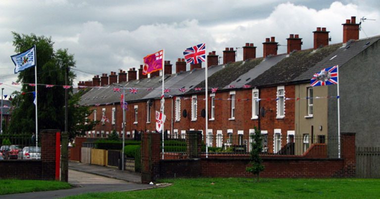 Tensions rise in East Belfast after man erects two flags.